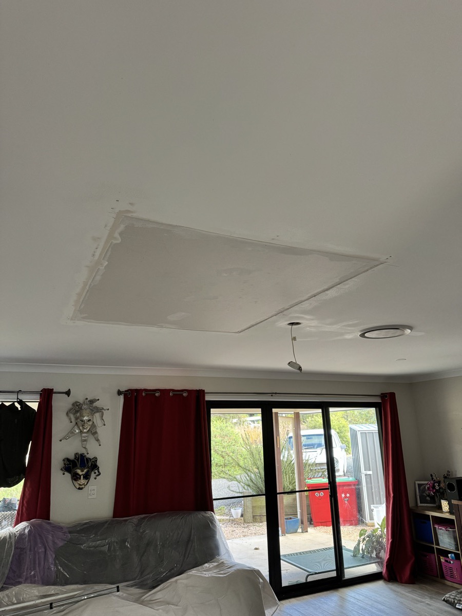 New plasterboard ceiling patch installed after mould affected material was removed in Meringandan West